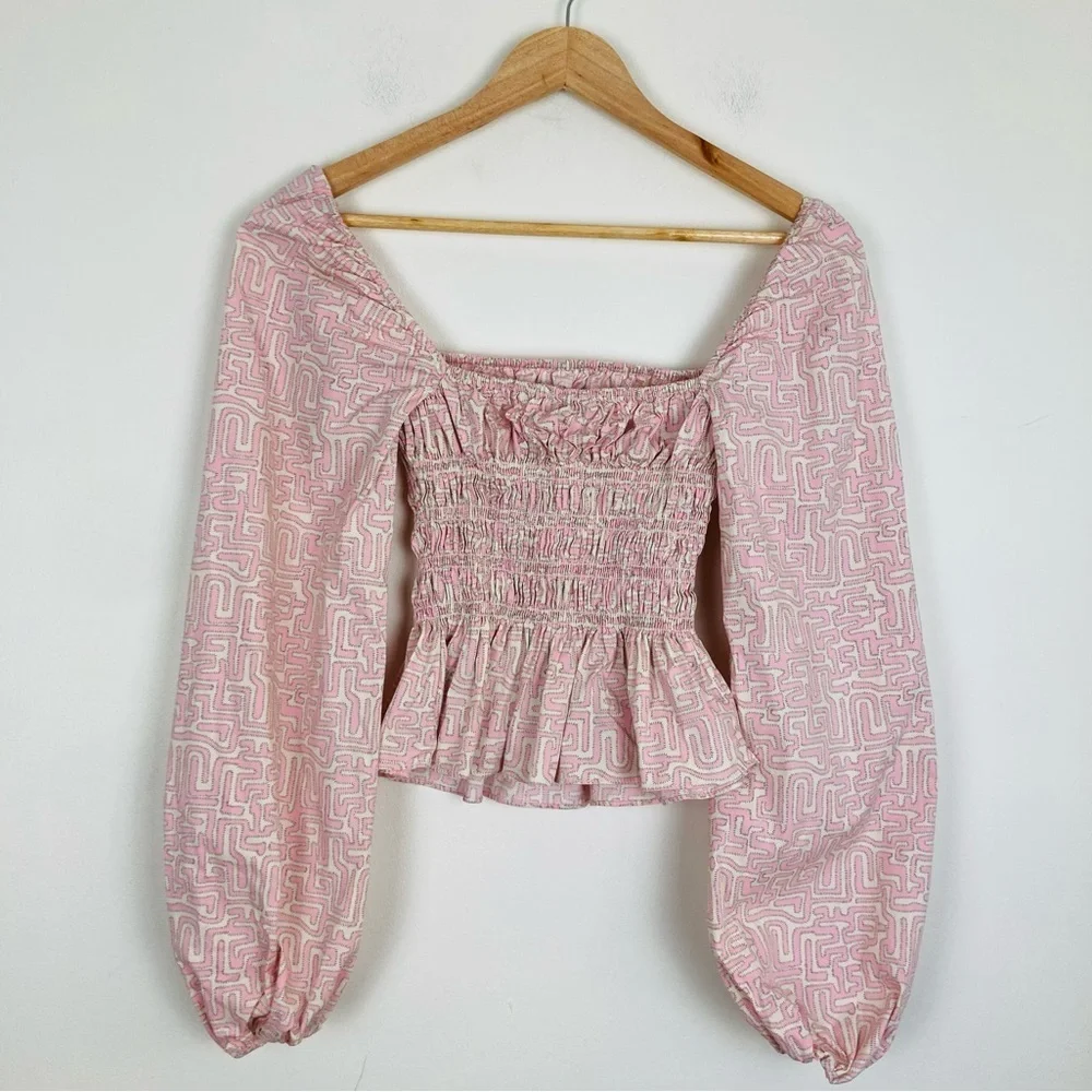 STAUD Jules smocked puff-sleeve peplum top in pink & cream 
